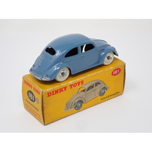 277 - A boxed Dinky Toys No.181 dark blue V.W. with spun hubs