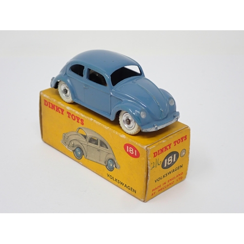 277 - A boxed Dinky Toys No.181 dark blue V.W. with spun hubs