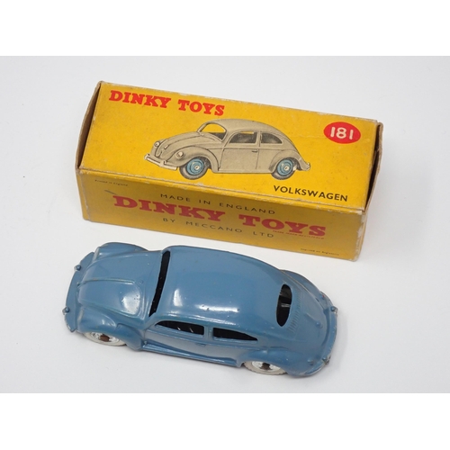 277 - A boxed Dinky Toys No.181 dark blue V.W. with spun hubs