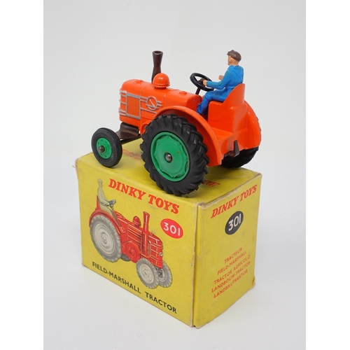 287 - A rare boxed Dinky Toys No.301 Field Marshall Tractor with green plastic front hubs