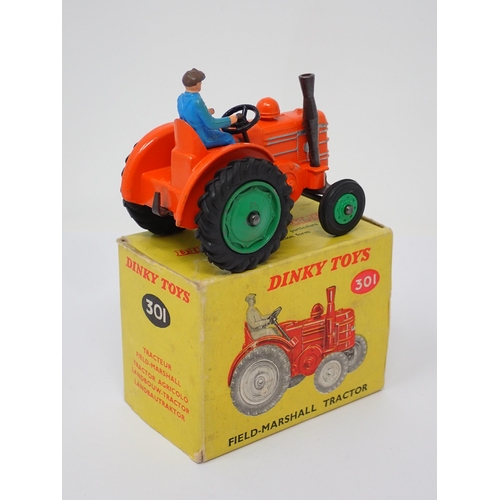 287 - A rare boxed Dinky Toys No.301 Field Marshall Tractor with green plastic front hubs