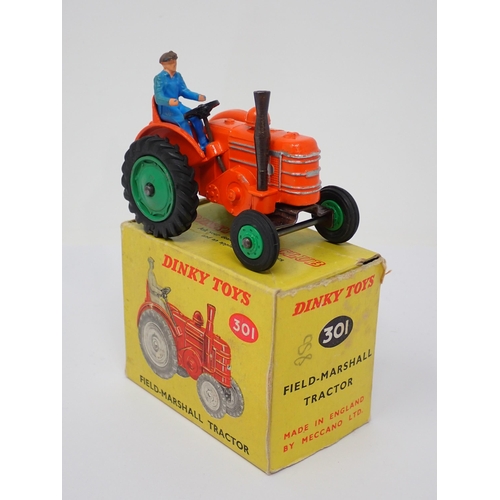 287 - A rare boxed Dinky Toys No.301 Field Marshall Tractor with green plastic front hubs