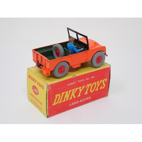 291 - A rare boxed Dinky Toys No.340 orange and green Land Rover with plastic hubs