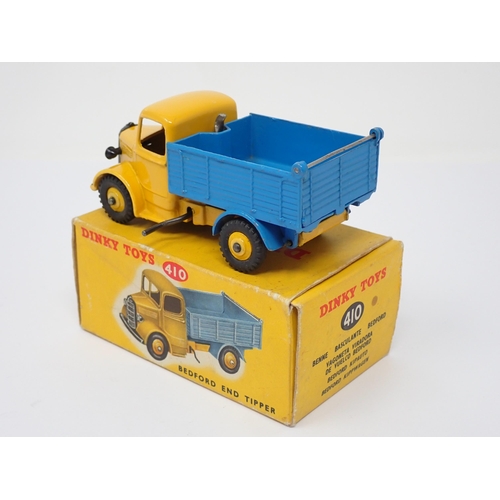 292 - A boxed Dinky Toys No.410 blue and yellow Bedford Tipper Lorry