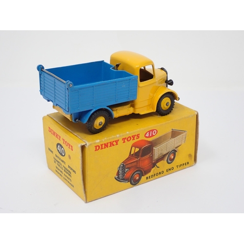 292 - A boxed Dinky Toys No.410 blue and yellow Bedford Tipper Lorry