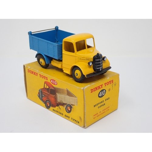 292 - A boxed Dinky Toys No.410 blue and yellow Bedford Tipper Lorry