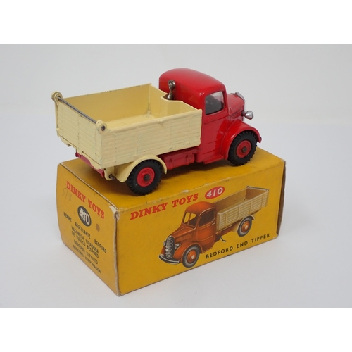 293 - A rare Dinky Toys No.410 green and red Bedford Tipper Lorry with plastic hubs