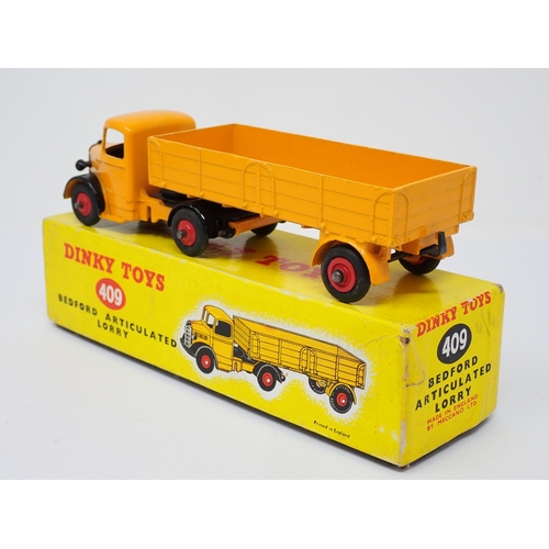 300 - A boxed Dinky Toys No.409 yellow Bedford Articulated Lorry