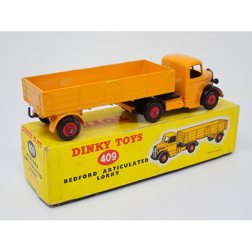 300 - A boxed Dinky Toys No.409 yellow Bedford Articulated Lorry