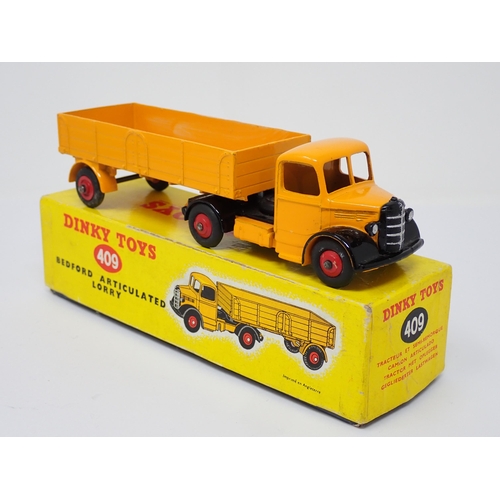 300 - A boxed Dinky Toys No.409 yellow Bedford Articulated Lorry