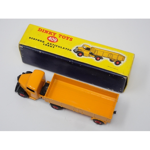 300 - A boxed Dinky Toys No.409 yellow Bedford Articulated Lorry