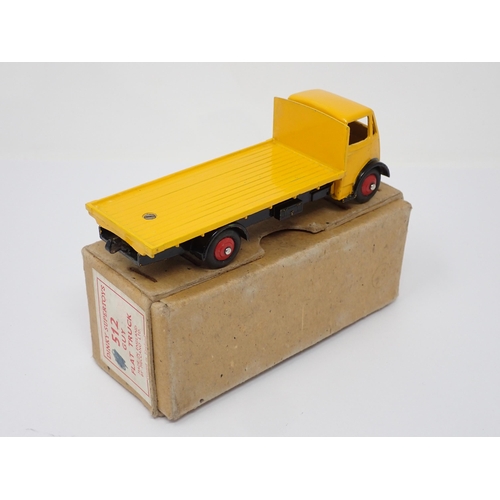 309 - A boxed Dinky Supertoys No.512 yellow Guy Flat Truck