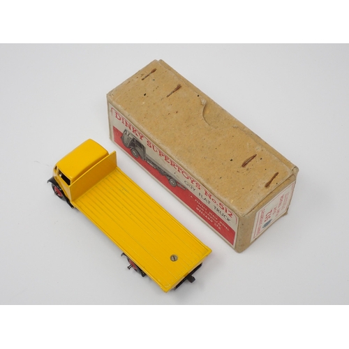 309 - A boxed Dinky Supertoys No.512 yellow Guy Flat Truck