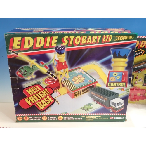 326 - A boxed Corgi Eddie Stobart Heli Freight Base, a boxed Corgi Eddie Stobart Lorry in hard plastic cas... 