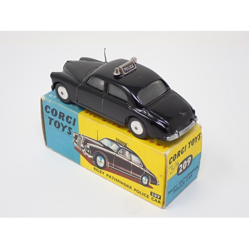 328 - A boxed Corgi Toys No.209 Riley Pathfinder Police Car