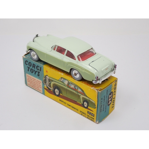 332 - A boxed Corgi Toys No.224 green and cream Bentley Continental Saloon