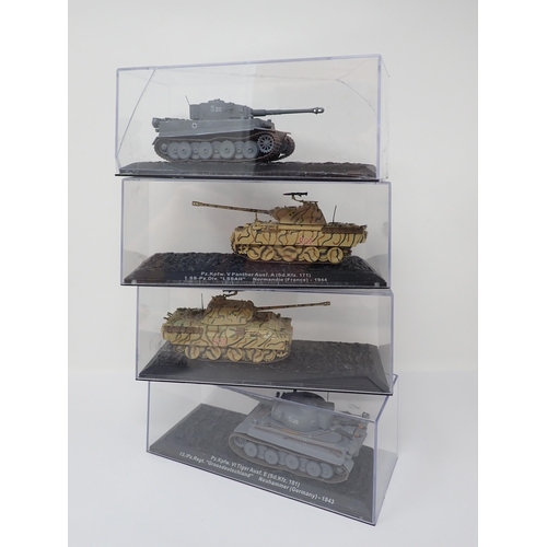 338 - Four boxed diecast Models of WWII Tanks in perspex cases, a boxed Dinky Toys No.451 Johnston Road Sw... 