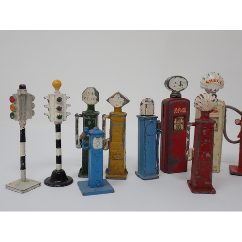 340 - Nine Dinky Toys Fuel Pumps and five Traffic Lights