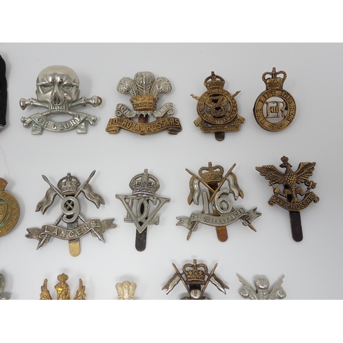 364 - Approximately 60 British Army Cap and Arm Badges (some possibly restrikes)