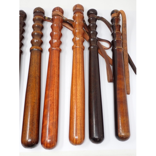 375 - Nine assorted wooden Police Truncheons