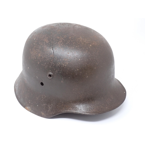 377 - An Officer's Dress Jacket by Hawkes & Co., a German WWII Helmet (cracked), a Soviet type Helmet, a S... 