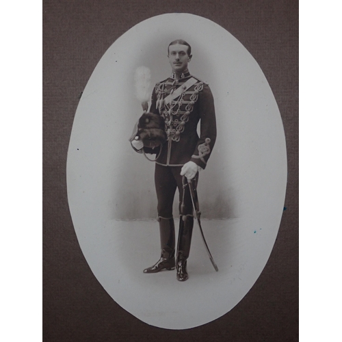 381 - Two Photos of WWI servicemen in needlework surrounds, a framed Decorations and Medals Poster and oth... 