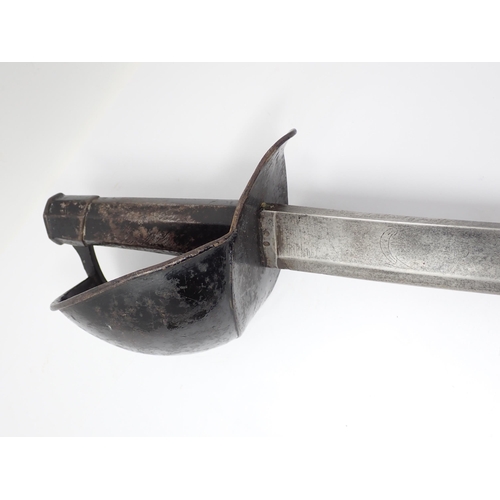 413 - A 19th Century French Naval Cutlass in leather scabbard