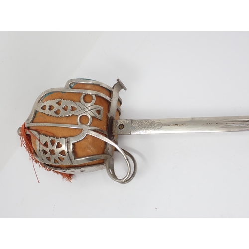 418 - A Scottish British Army Officer's basket hilted Sword in steel scabbard