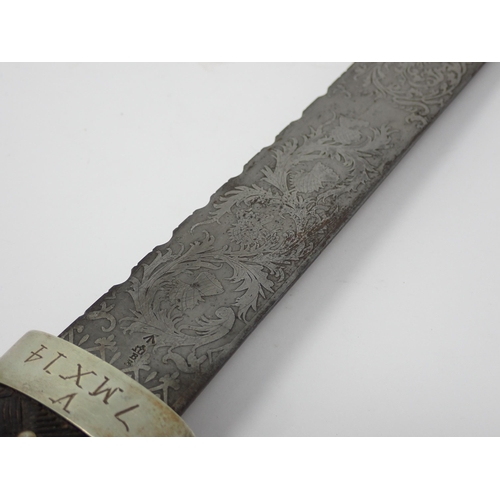 442 - A late Victorian Highland Regimental Dirk by Mole, etched blade dated 1900 at the Ricasso