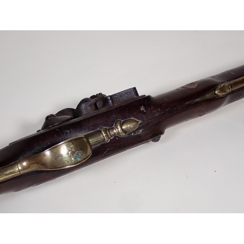 452 - An early flintlock brass barrelled Blunderbuss engraved 'London' on the 16in barrel, significant los... 