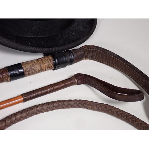 463 - An antler handled Hunting Whip by Swaine, a child's Hunting Whip, a Locke & Co. black Bowler Hat, Mo... 