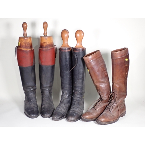 464 - A pair of black leather gentleman's Riding Boots with tan tops and wooden trees, a pair of black lea... 