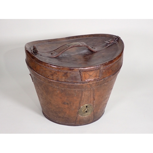 465 - An antique leather Top Hat Box, a Herbert Johnson black Bowler Hat in box and a Herbert Johnson Top ... 