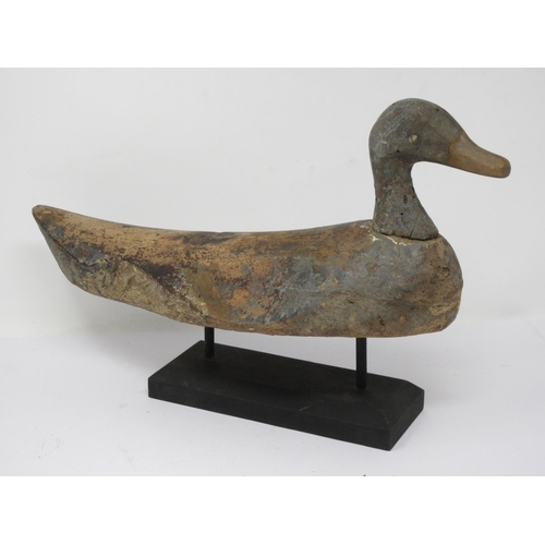 471 - Two carved and painted Continental Duck Decoys, one with tethering weight