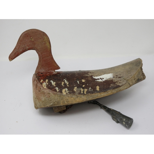 471 - Two carved and painted Continental Duck Decoys, one with tethering weight