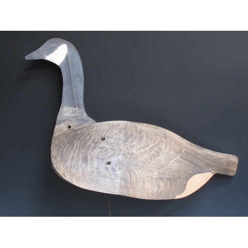 472 - Eight Johnson's folding Canada Goose Decoys with stakes