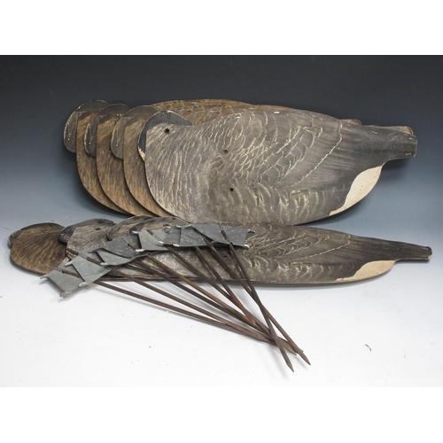 472 - Eight Johnson's folding Canada Goose Decoys with stakes