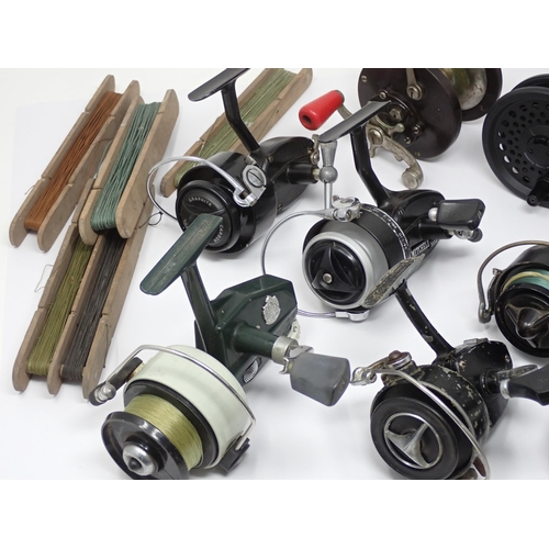 516 - A Mitchell 300 Fixed Spool Reel, a Mitchell 300a Fixed Spool Reel, Mitchell 304 Reel, a BFR Superfly... 