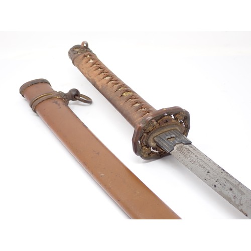 437 - A Japanese Katana with pierced tsuba and bound shagreen grip in metal scabbard, cutting edge 64 1/2c... 