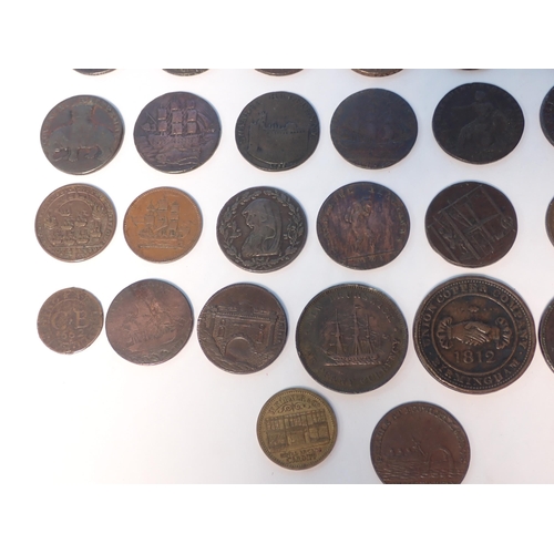 133 - A collection of Trade Tokens, 17th-19th Century, to include Bristol 1662 Farthing, a Wellington Coss... 