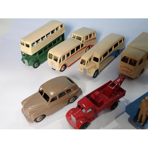 281 - Nine unboxed Dinky Toys including streamline Coach, Observatory Coach, Fire Tender, Vanguard, N.C.B.... 