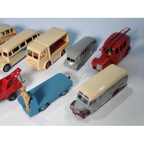 281 - Nine unboxed Dinky Toys including streamline Coach, Observatory Coach, Fire Tender, Vanguard, N.C.B.... 