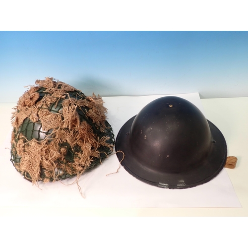 382 - Two WWII Helmets painted black for home service use, one with leather neck guard. A Dispatch Rider's... 