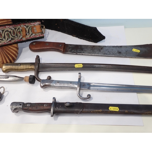 435 - A French Chassepot Bayonet dated 1874; a 1907 pattern Enfield Bayonet with steel scabbard; an Arab J... 