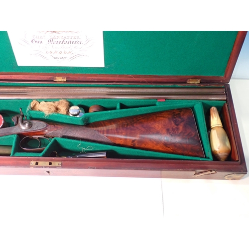 444 - A 19th Century 12 bore Percussion Shotgun by Charles Lancaster, London with damascus barrels, foliat... 