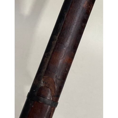 447A - A 19th Century long barrelled Musket with straight cut stock 6ft L