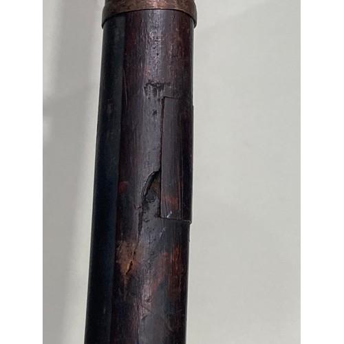 447A - A 19th Century long barrelled Musket with straight cut stock 6ft L