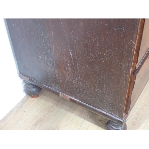 1 - A Victorian mahogany Linen Press the upper section fitted pair of arched doors above base of two sho... 