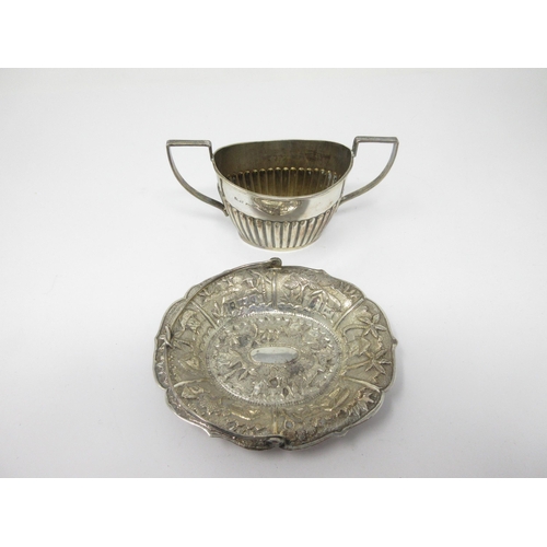 102 - A silver two-handled oval semi-fluted Sugar Bowl, Chester hallmarks, and a small Indian silver Trink... 