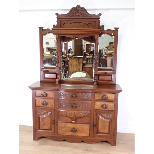 12 - A Victorian Art Noveau walnut mirror back Sideboard fitted seven drawers and pair of cupboard doors ... 